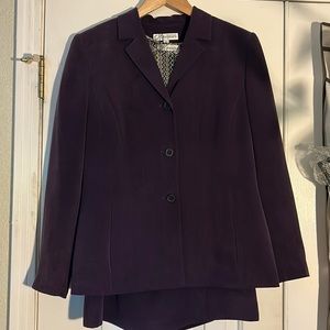 Dressbarn suit, in a rich grape color, this suit is full of details in a size10.